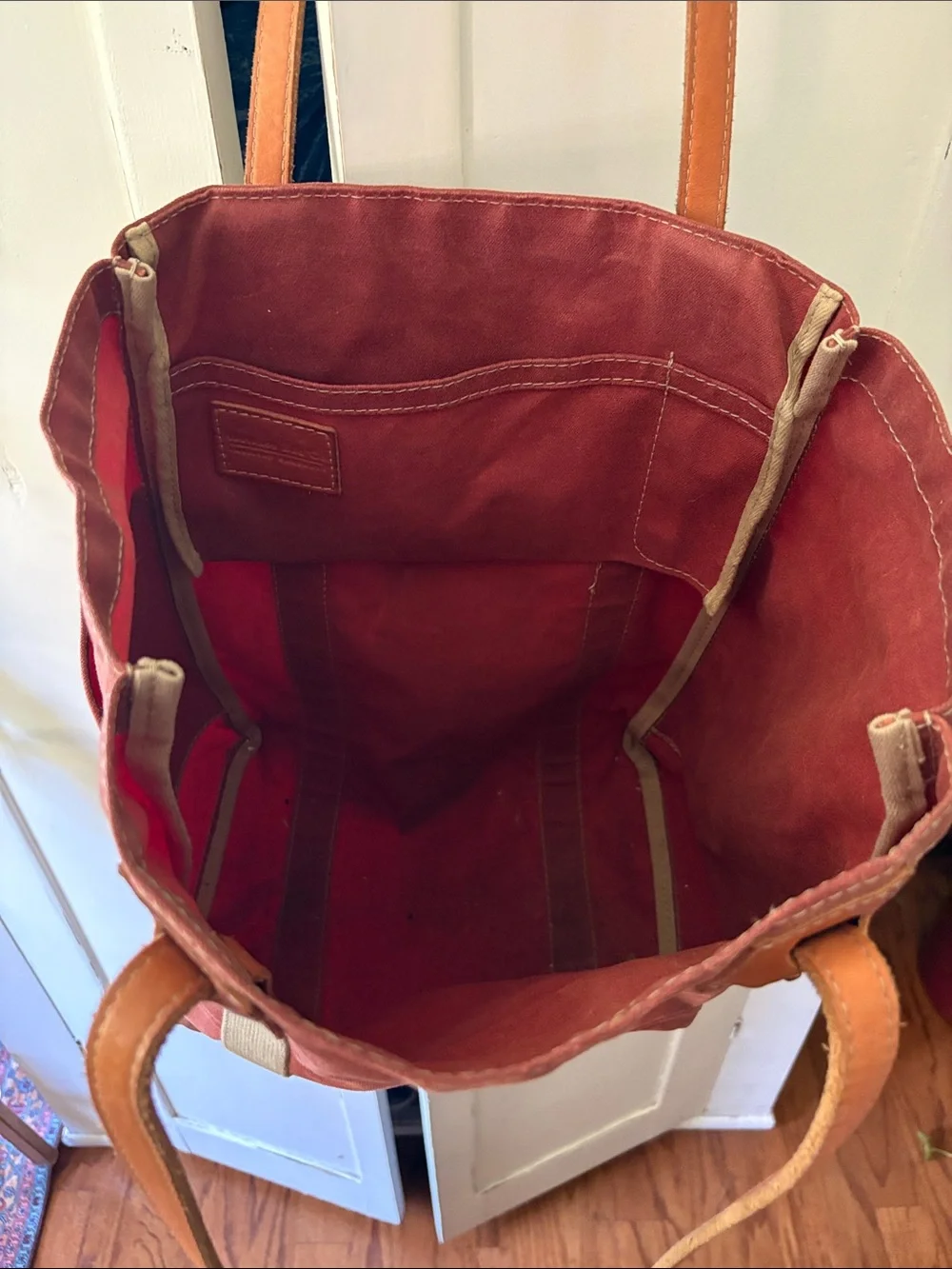 Artifact brand Rust Waxed Canvas Tote Bag with leather riveted handle